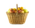 Ripe fruits and apples in wicker basket