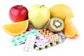 Fruits and colorful pills Royalty Free Stock Photo