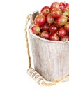 Ripe gooseberry in wooden bucket Royalty Free Stock Photo