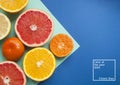 Ripe grapefruit on blue background