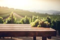Ripe grapes on wooden table in vineyard, Tuscany, Italy