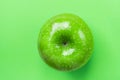 Ripe Green Apple on Greenery Background. Color Sample. Flat Lay Top View Thanksgiving Harvest Autumn Fall Gratefulness. Vegan Food