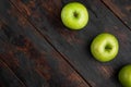 Ripe green apples, on old dark rustic table background, top view flat lay, with copy space for text Royalty Free Stock Photo