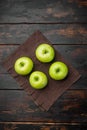 Ripe green apples, on old dark rustic table background, top view flat lay Royalty Free Stock Photo