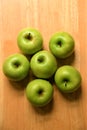 Ripe green Granny Smith apples on wooden background Royalty Free Stock Photo