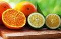 Ripe and green oranges