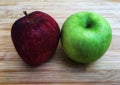 Ripe green and red apple whole piece on wooden background Royalty Free Stock Photo