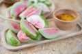 Ripe guava fruit cut with sweet sauce. Selective focus