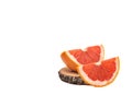 Ripe half of pink grapefruit citrus fruit isolated on white background. full depth of field