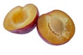 Ripe half plums fruit isolated on white Royalty Free Stock Photo