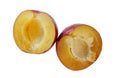 Ripe half plums fruit isolated on white Royalty Free Stock Photo