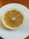 Ripe half of yellow lemon. Closeup of yellow fruits.