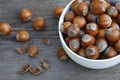 Ripe hazelnuts in a bowl on a wooden table Royalty Free Stock Photo