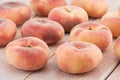 Ripe juicy chinese flat peaches Royalty Free Stock Photo