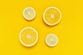 Ripe juicy lemons, orange on bright yellow background. Lemon fruit, citrus minimal concept, vitamin C. Creative summer Royalty Free Stock Photo