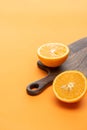 Ripe juicy orange halves on wooden Royalty Free Stock Photo