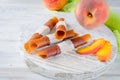 Ripe juicy peach and peach candy pastille Royalty Free Stock Photo
