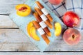 Ripe juicy peach and peach candy pastille Royalty Free Stock Photo