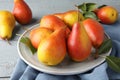 Ripe juicy pears on grey wooden table, closeup Royalty Free Stock Photo