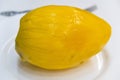 Ripe juicy peeled mango on a plate, diet, delicacy