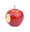 Ripe juicy red apple with bite mark on white Royalty Free Stock Photo