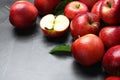 Ripe juicy red apples on grey table Royalty Free Stock Photo