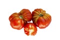 Ripe juicy red ribbed tomatoes of the Minusinsky shar-pei variety. Natural products and vitamins. Isolated on white background.