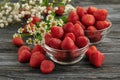 ripe juicy strawberries in two glass bowls, berries on the table Royalty Free Stock Photo