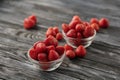 ripe juicy strawberries in two glass bowls Royalty Free Stock Photo