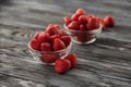 ripe juicy strawberries in two glass bowls Royalty Free Stock Photo