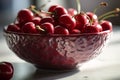 Large ripe juicy tasty cherries in a ceramic red bowl on the table made with generative AI Royalty Free Stock Photo