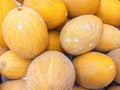 Ripe juicy sweet melons on supermarket counter