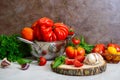 Ripe juicy tomatoes of different varieties, green fragrant basil, garlic Royalty Free Stock Photo