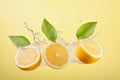 Ripe lemons and leaves flying in the air with splashes of water on yellow background. AI generated