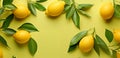 Ripe lemons and lemon leaves on a yellow background. Top view