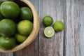 Ripe lime slice on rustic background- selected focus with copy space