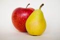 Ripe little pear with an apple