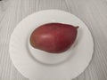 Ripe mango on the white plate Royalty Free Stock Photo