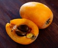 Ripe medlar fruits nispero on wooden surface Royalty Free Stock Photo