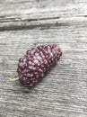 Ripe mulberry fruit on wooden table Royalty Free Stock Photo