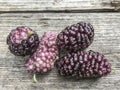 Ripe mulberry fruit on wooden table Royalty Free Stock Photo