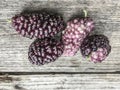 Ripe mulberry fruit on wooden table Royalty Free Stock Photo