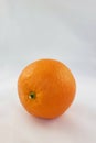 Ripe Navel Orange in front of a white background Royalty Free Stock Photo
