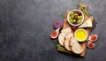 Ripe olives, figs, olive oil and ciabatta bread Royalty Free Stock Photo