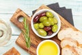 Ripe olives, olive oil and ciabatta bread Royalty Free Stock Photo