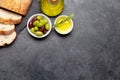 Ripe olives, olive oil and ciabatta bread Royalty Free Stock Photo