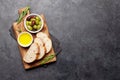 Ripe olives, olive oil and ciabatta bread Royalty Free Stock Photo