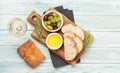 Ripe olives, olive oil and ciabatta bread Royalty Free Stock Photo