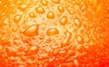 Ripe Orange Background texture with waterdrops macro studio shot