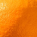 Ripe orange peel background. Close up view Royalty Free Stock Photo
